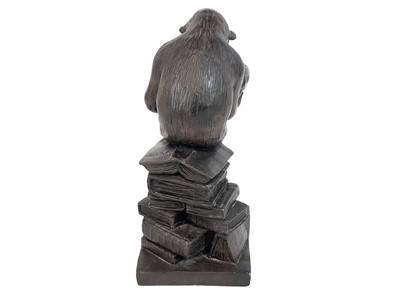 Lot 11 - A resin model of Darwin's ape.