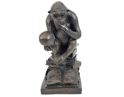 Lot 11 - A resin model of Darwin's ape.