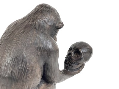 Lot 11 - A resin model of Darwin's ape.