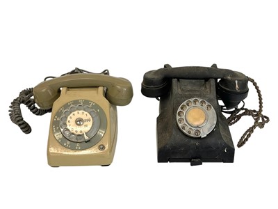 Lot 67 - A mid century bakelite telephone.