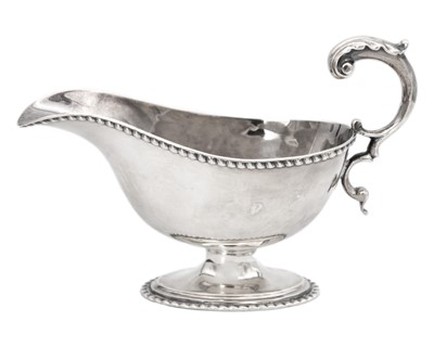 Lot 9 - A Victorian silver sauce boat by Maurice Freeman.