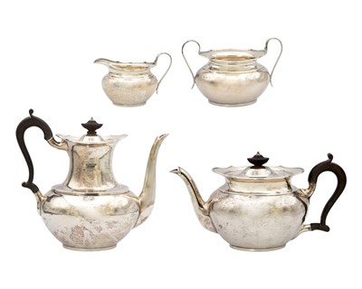 Lot 5 - A George V silver four-piece tea set by Thomas Bradbury & Sons Ltd.