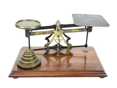 Lot 49 - A set of Victorian mahogany and brass postal scales, by Avery.