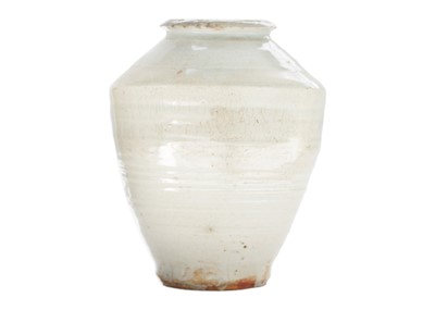 Lot 784 - A Chinese celadon jar.