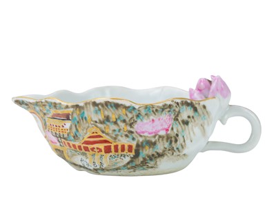 Lot 664 - A Chinese lotus moulded sauceboat.