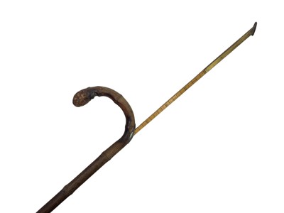 Lot 20 - A sectional tippling cane.