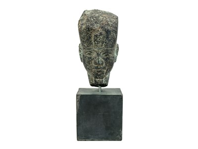 Lot 1051 - An Egyptian granite head of a pharaoh.
