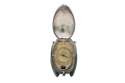 Lot 1130 - Silver English flower bud four section watch locket
