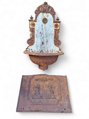 Lot 351 - A cast iron wall fountain.