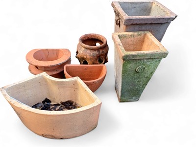Lot 354 - A terracotta curved rectangle planter.