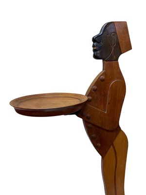 Lot 12 - A pair of mahogany figural dumb waiters.