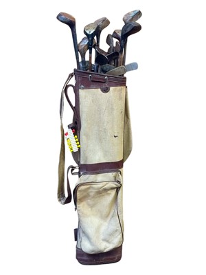 Lot 51 - Eight hickory shafted golf woods.