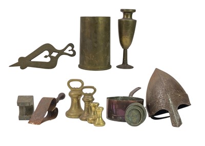 Lot 56 - A collection of seven various brass weights.