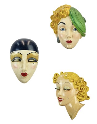 Lot 32 - An Art Deco plaster face mask wall plaques of pierot.