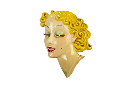 Lot 32 - An Art Deco plaster face mask wall plaques of pierot.