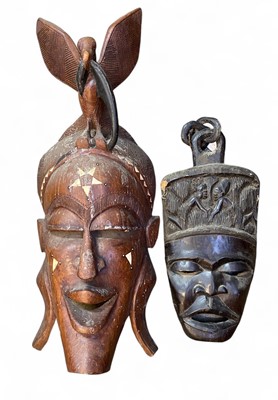 Lot 44 - A large African carved mask.
