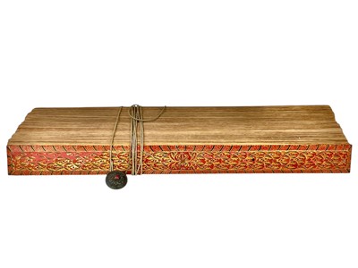 Lot 774 - A Sinhalese ola or palm leaf manuscript.