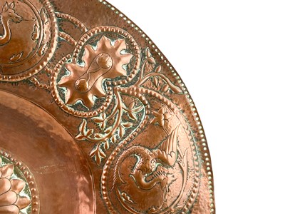Lot 24 - An Arts and Crafts circular copper dish.