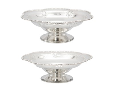 Lot 2 - A pair of George V silver pedestal fruit dishes by Barker Brothers.