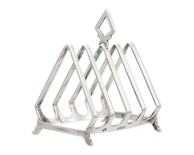 Lot 136 - An Art Deco silver four-slice toast rack by Adie Brothers.