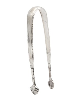 Lot 12 - A rare Irish early 18th-century silver pair of sugar tongs by David King.