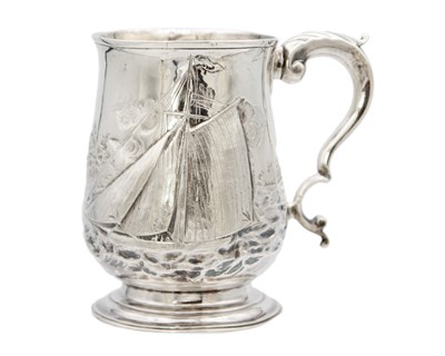 Lot 13 - A George III silver embossed baluster mug, London 1770.