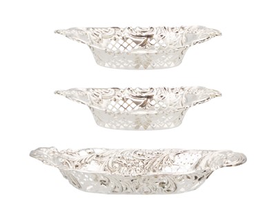 Lot 18 - An Edwardian silver embossed oval bonbon dish by Robert Pringle & Sons.