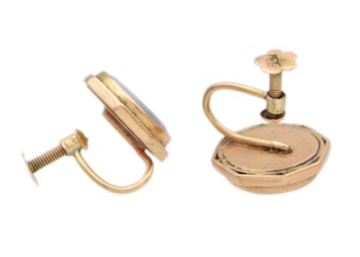 Lot 40 - A pair of round cabochon opal earrings in 9k rose gold.
