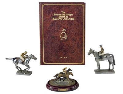 Lot 32 - A chrome plated brass car mascot of a horse and jockey.