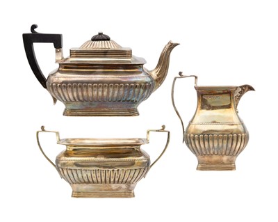 Lot 90 - A Victorian silver three-piece tea set retailed by Watherston London.
