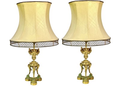 Lot 320 - A pair of French Napoleon III ormolu table lamps.