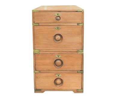 Lot 518 - A teak campaign style two-part chest.