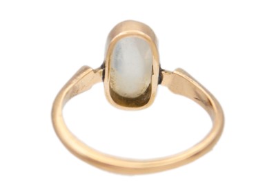 Lot 21 - A 9ct gold moonstone solitaire ring.