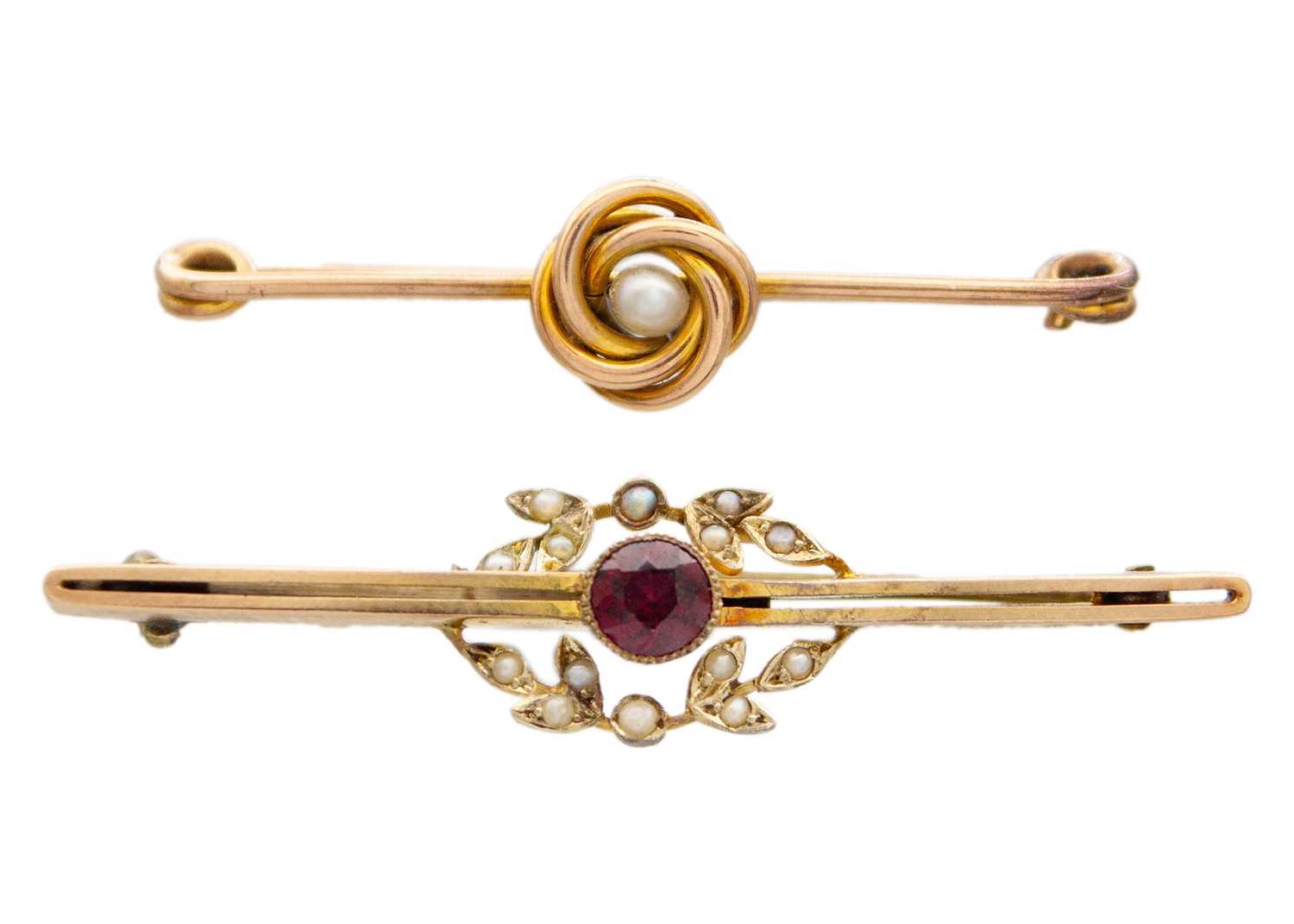 Lot 38 - A selection of two gold bar brooches.