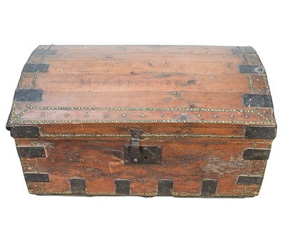 Lot 870 - A stud decorated pine dome top trunk.