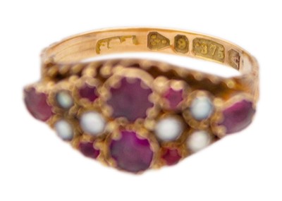 Lot 44 - A Victorian 9k garnet, ruby, and split pearl set, closed-back ring.