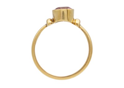 Lot 46 - A 14k gold pink tourmaline solitaire ring.