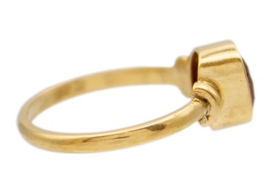Lot 46 - A 14k gold pink tourmaline solitaire ring.