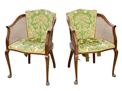 Lot 472 - A pair of mahogany bergere tub chairs.