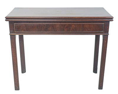 Lot 462 - A George III figured mahogany fold top tea table.