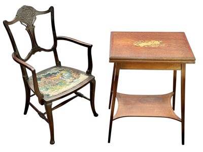 Lot 510 - An Edwardian mahogany and satinwood banded fold top card table.
