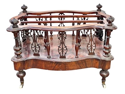 Lot 520 - A Victorian walnut serpentine Canterbury or magazine rack.