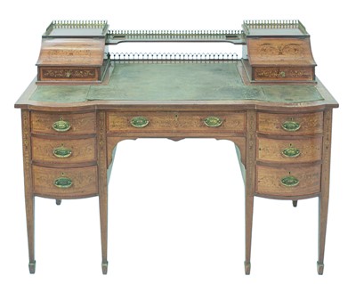 Lot 484 - A late Victorian mahogany and inlaid writing desk.
