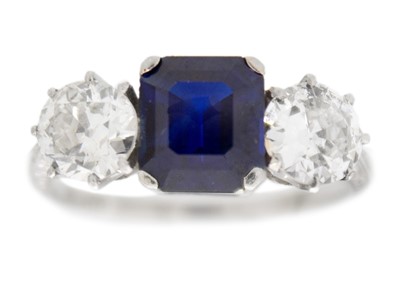 Lot 8 - A superb natural sapphire, possibly Burmese, diamond three-stone ring