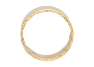 Lot 42 - A 9k gold wide band ring.
