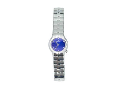 Lot 1054 - TAG HEUER - An Alter Ego stainless steel lady's quartz wristwatch.