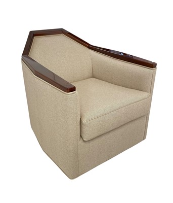 Lot 426 - Superyacht furnishings, a low armchair on a swivel base.