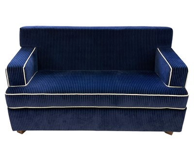 Lot 398 - Superyacht furnishings, a contemporary two-seater blue sofa.