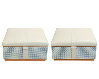 Lot 425 - Superyacht furnishings, a pair of cream leather square storage ottomans.