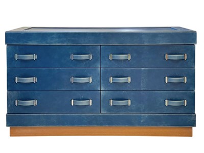 Lot 413 - Superyacht furnishings, a blue leather chest of six drawers.